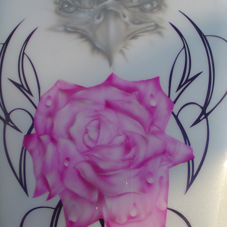 custom painted motorcycle with airbrushed eagles, roses and pin striping