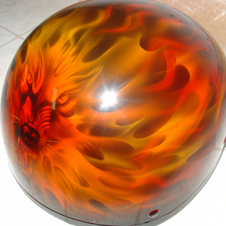 wolf with real fire on motorcycle helmet