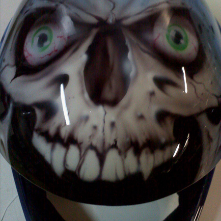 airbrushed skull on sky diving helmet