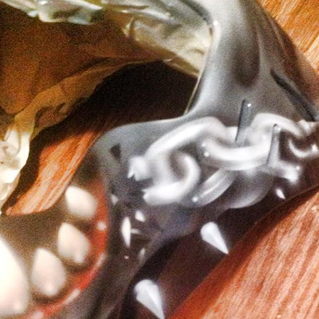 airbrushed  broken chain painted on goalie mask